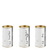 three canisters with organic loose leaf tea