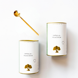 two canisters with gold teaspoon impala peacock