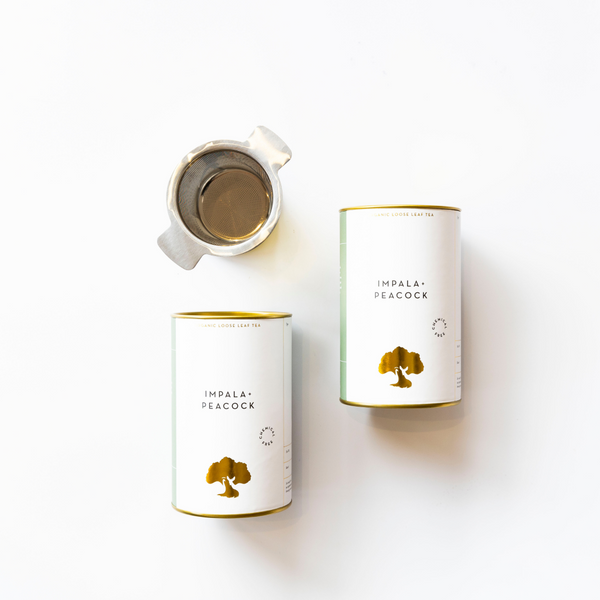 tea gift set with two canisters and stainless steel strainer