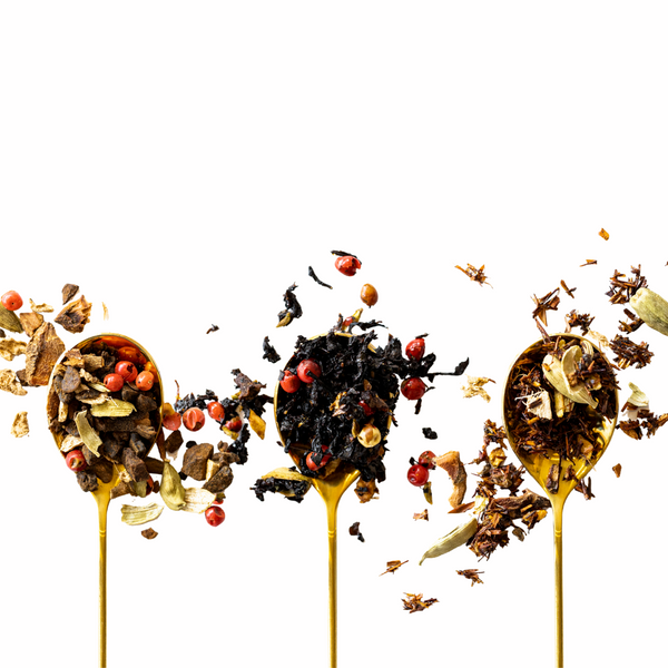 three spoons with wattleseed chai, peacock chai, and rooibos chai