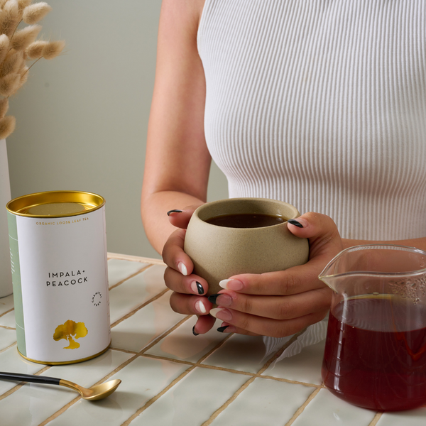 holding mug