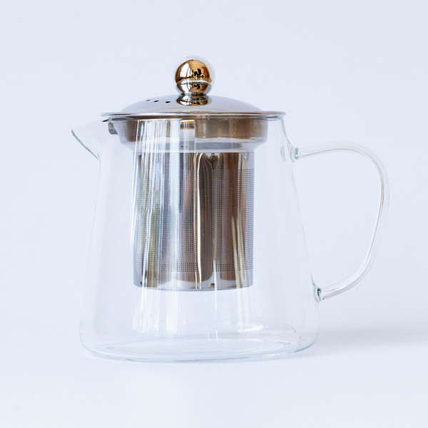teapot with silver strainer